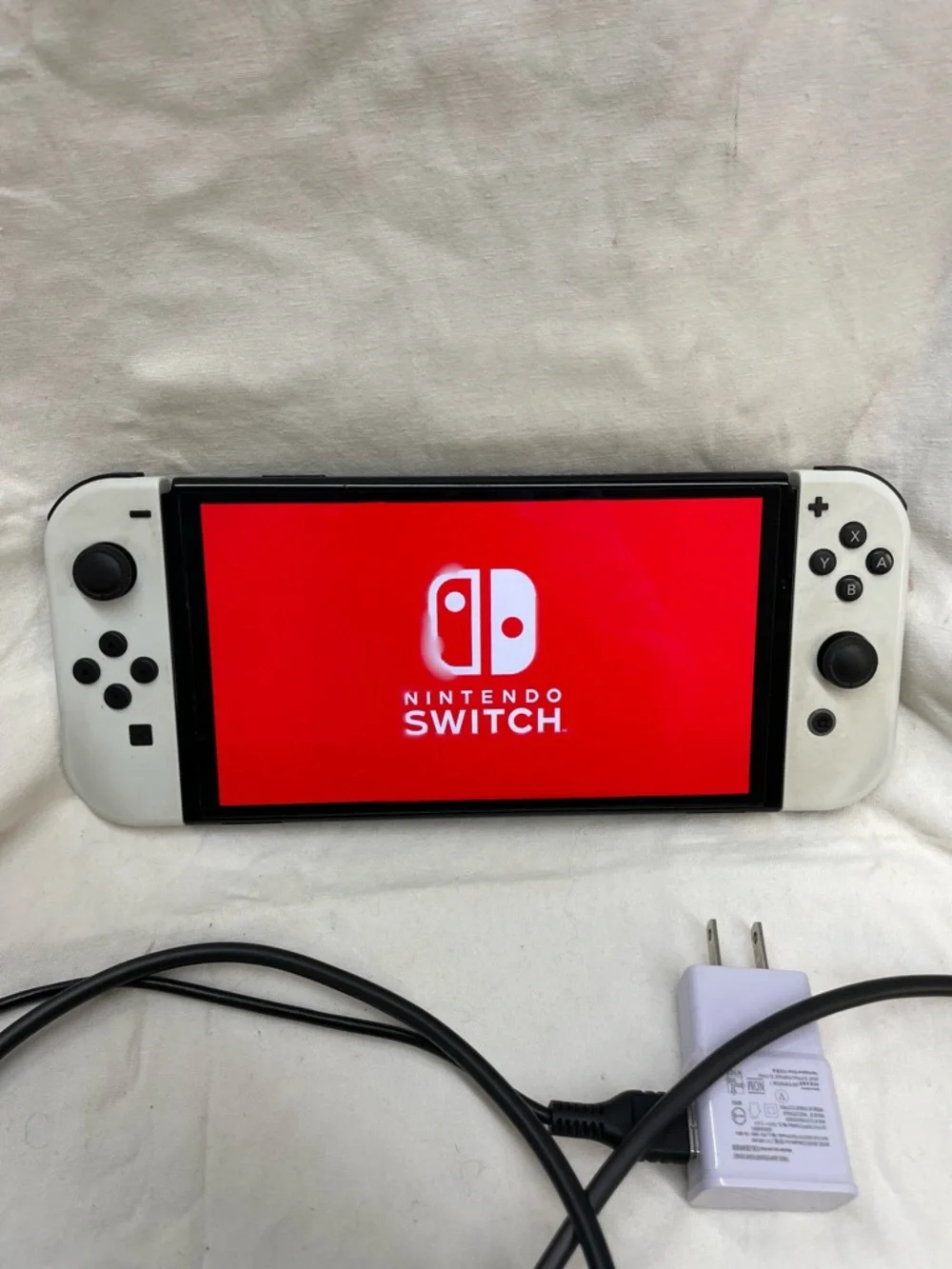 Nintendo switch White Gaming Console with Detachable Controllers/charging dock